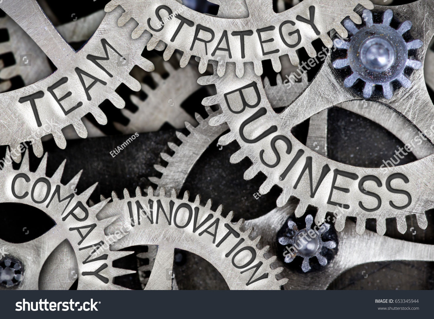 stock photo macro photo of tooth wheel mechanism with business strategy innovation team and company concept 653345944
